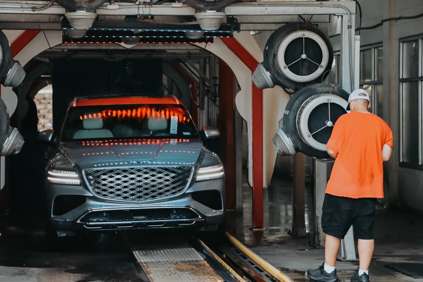 A car moving through the wash tunnel at Classic Car Wash in Texarkana